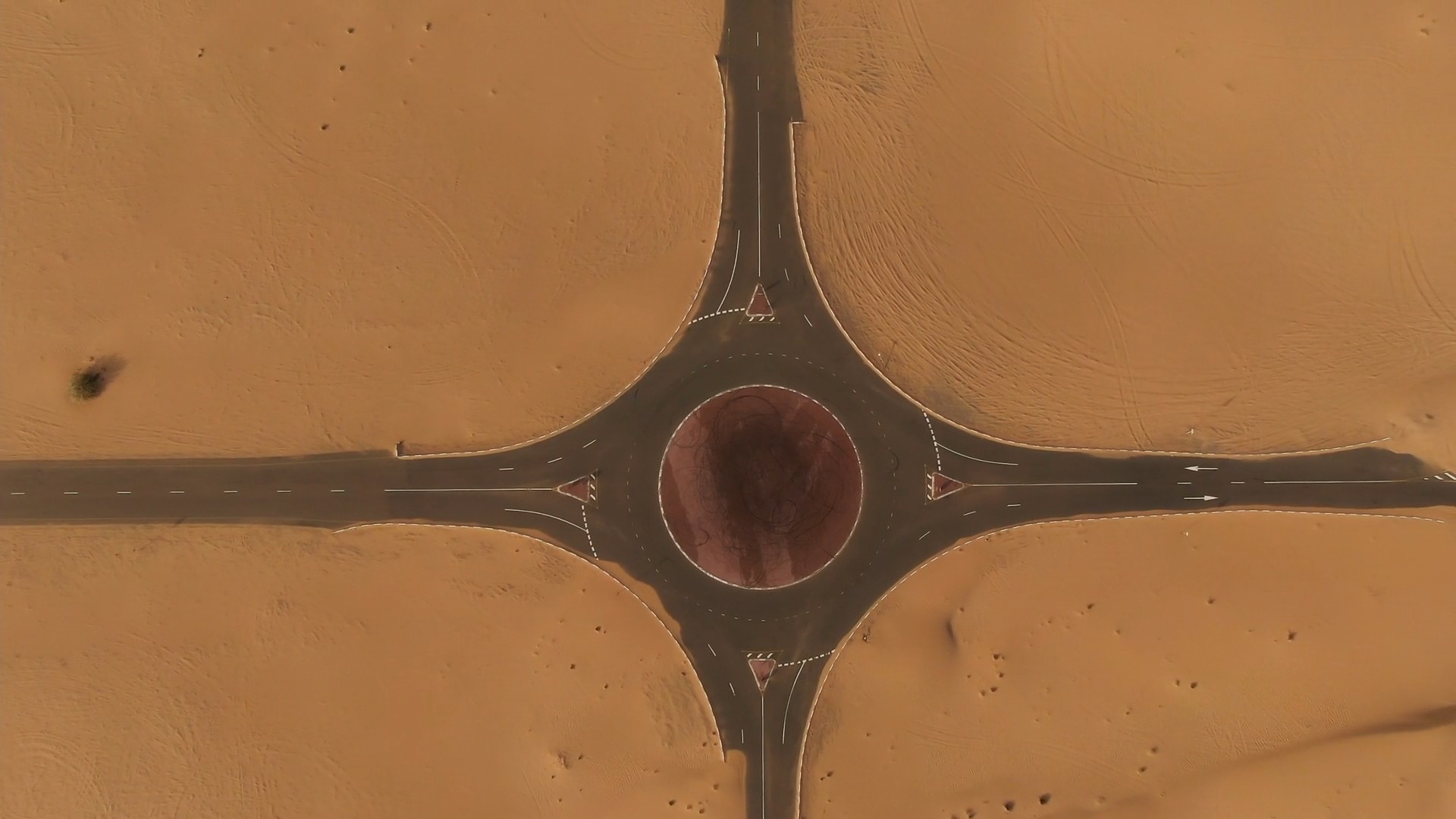 Aerial view of a desert road junction in Dubai
