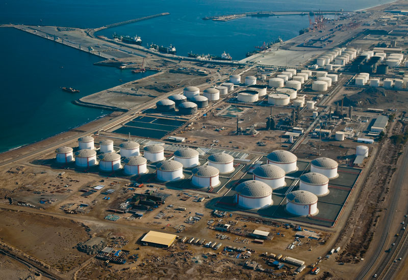 Aerial view of the Fujairah coastline with petroleum storage tanks and the port