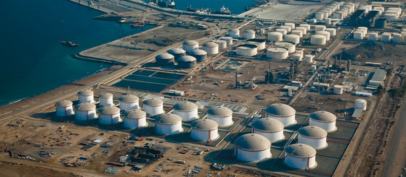Aerial view of the Fujairah coastline with petroleum storage tanks and the port